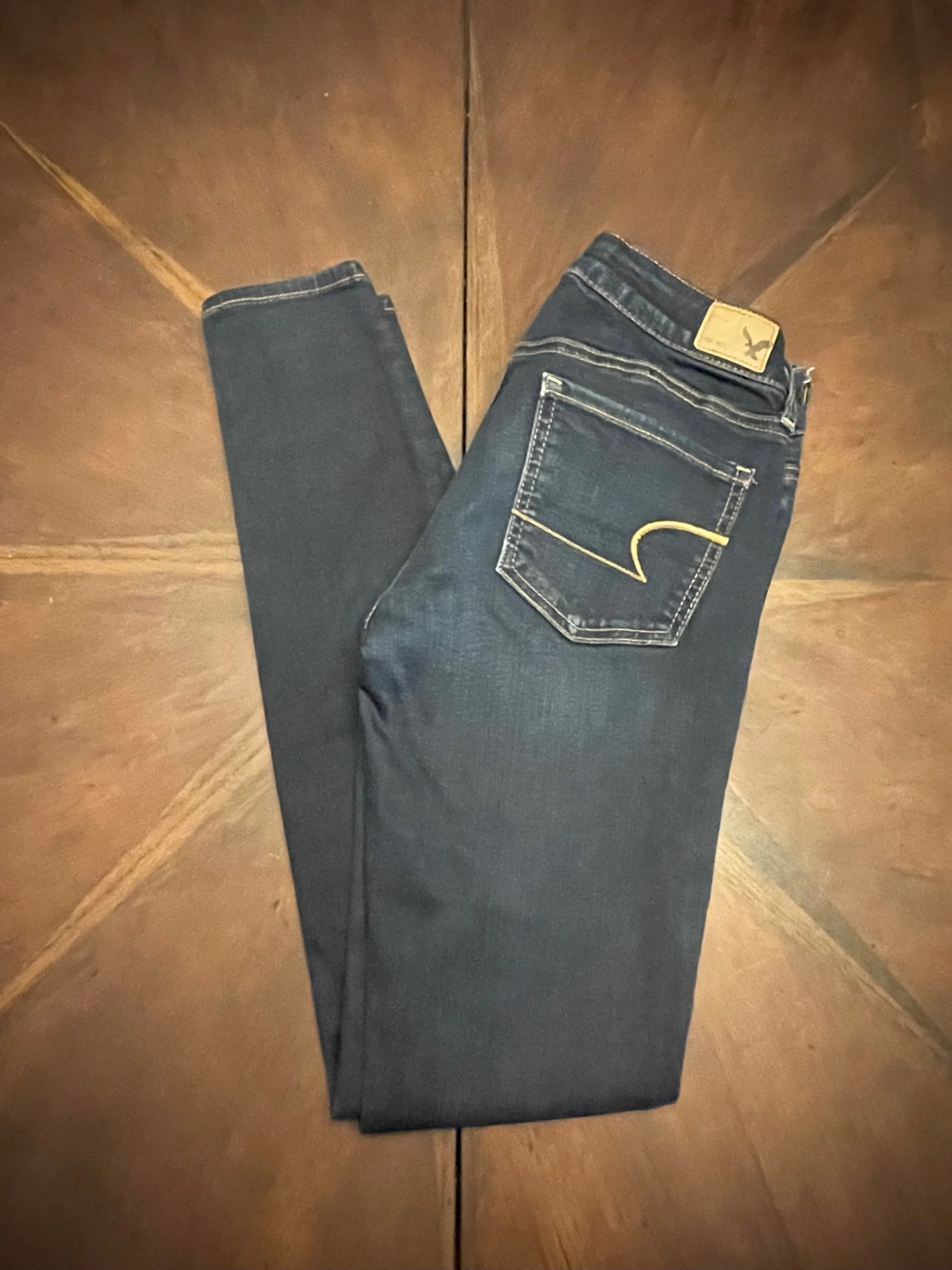 American Eagle Low-Rise Skinny Blue Jeans with Orange Stitching