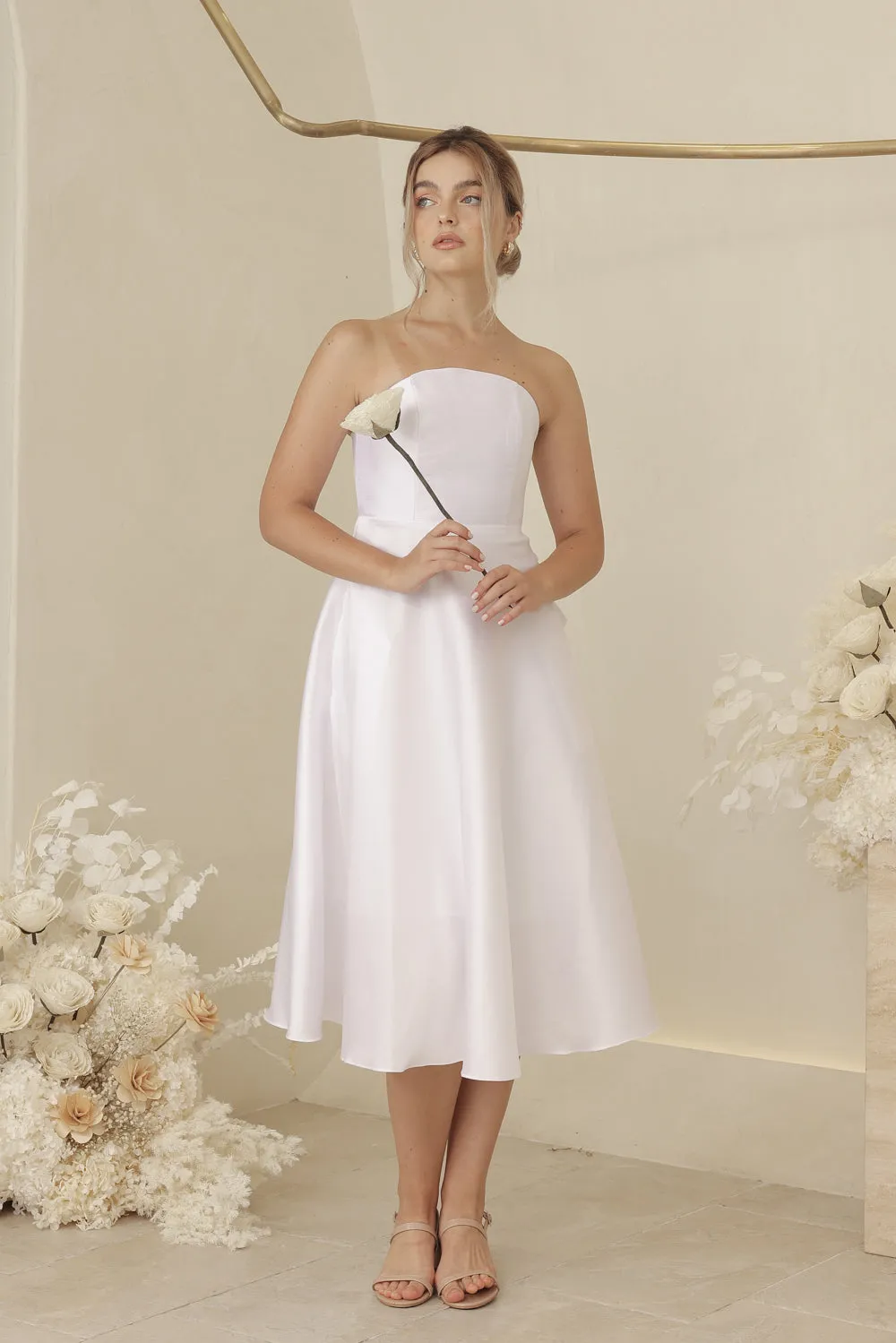 CELINE Strapless Curved Neckline Mid Length Gown with Bow, Pockets and Covered Buttons (White Gazaar)