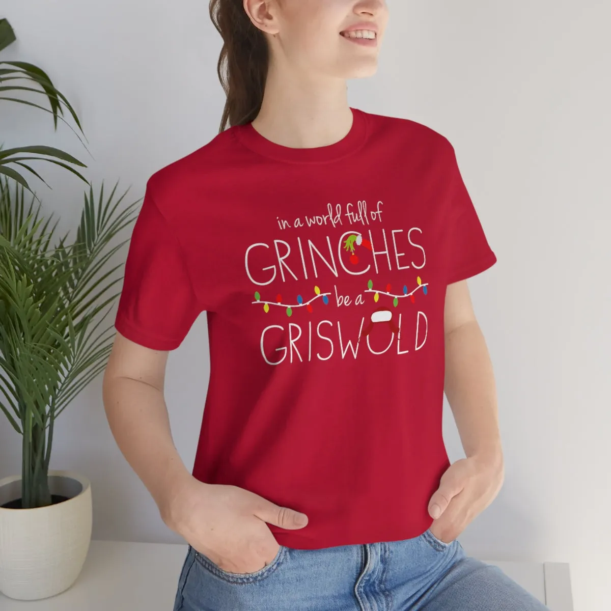 In a world full of GRINCHES be a GRISWOLD-Unisex Jersey Short Sleeve Tee