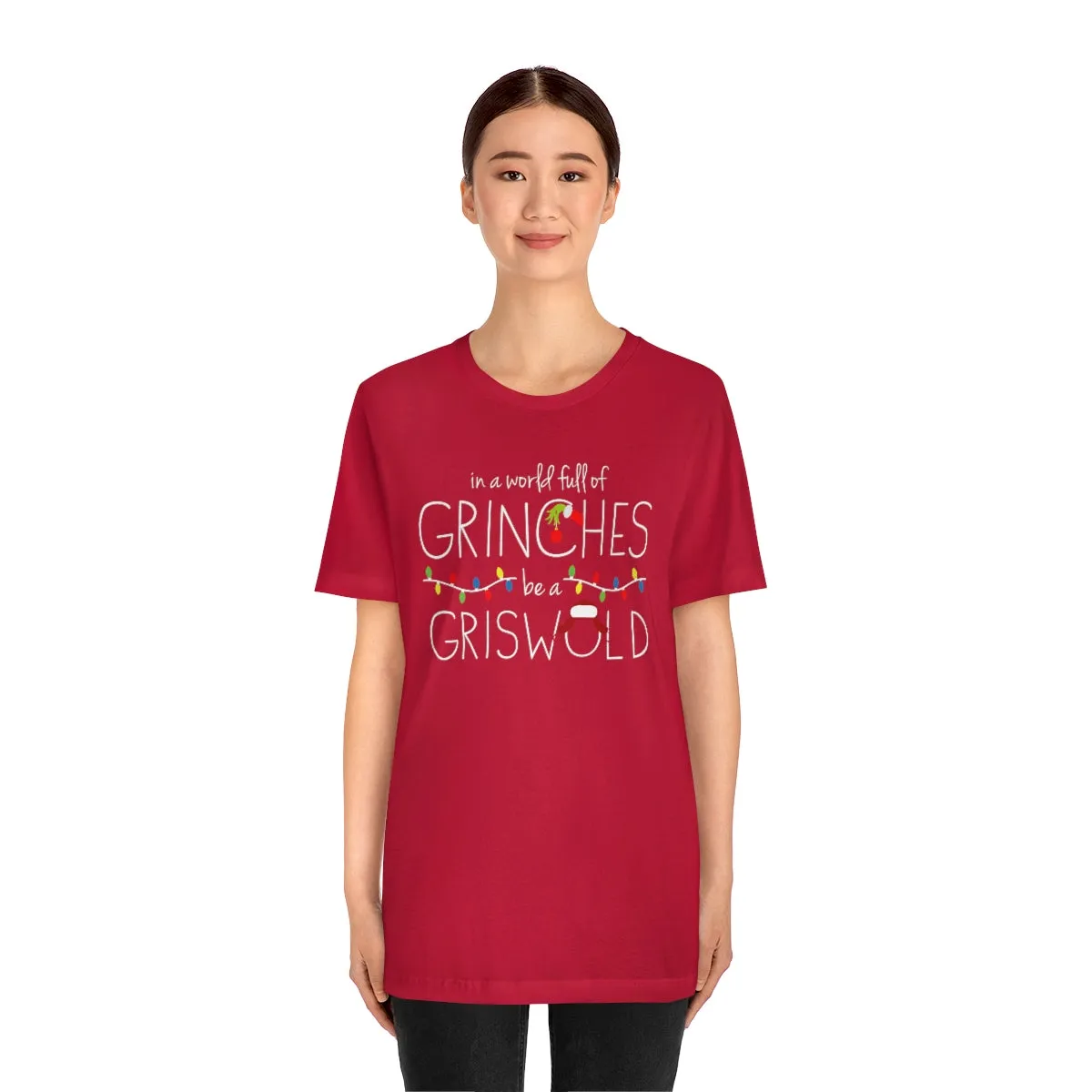 In a world full of GRINCHES be a GRISWOLD-Unisex Jersey Short Sleeve Tee