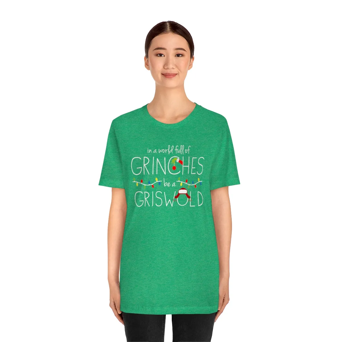 In a world full of GRINCHES be a GRISWOLD-Unisex Jersey Short Sleeve Tee