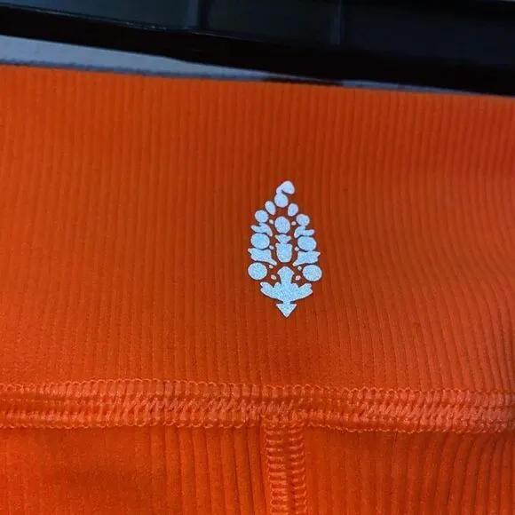 NWT Free People Throw burning up neon orange ribbed shorts LARGE