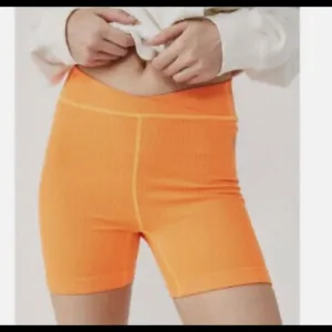 NWT Free People Throw burning up neon orange ribbed shorts LARGE