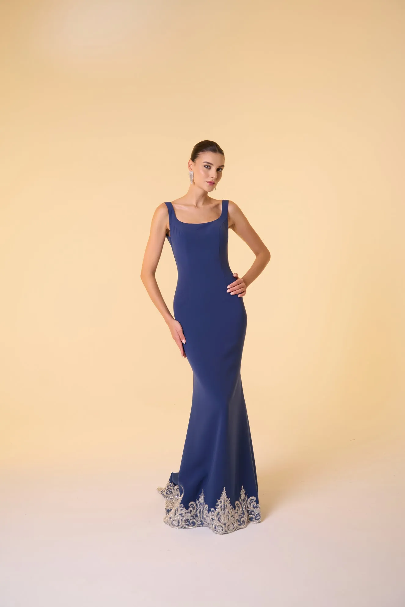 Scoop neck crepe gown with embellished hem