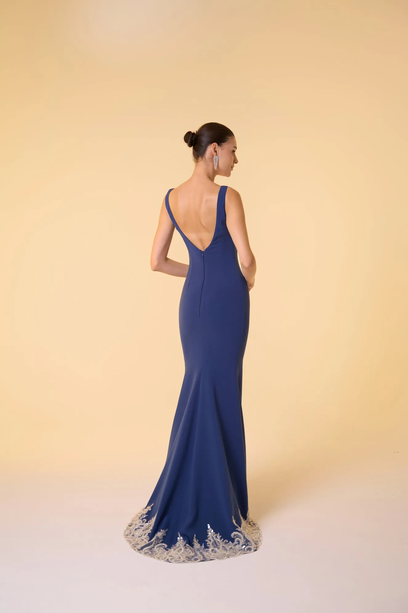 Scoop neck crepe gown with embellished hem