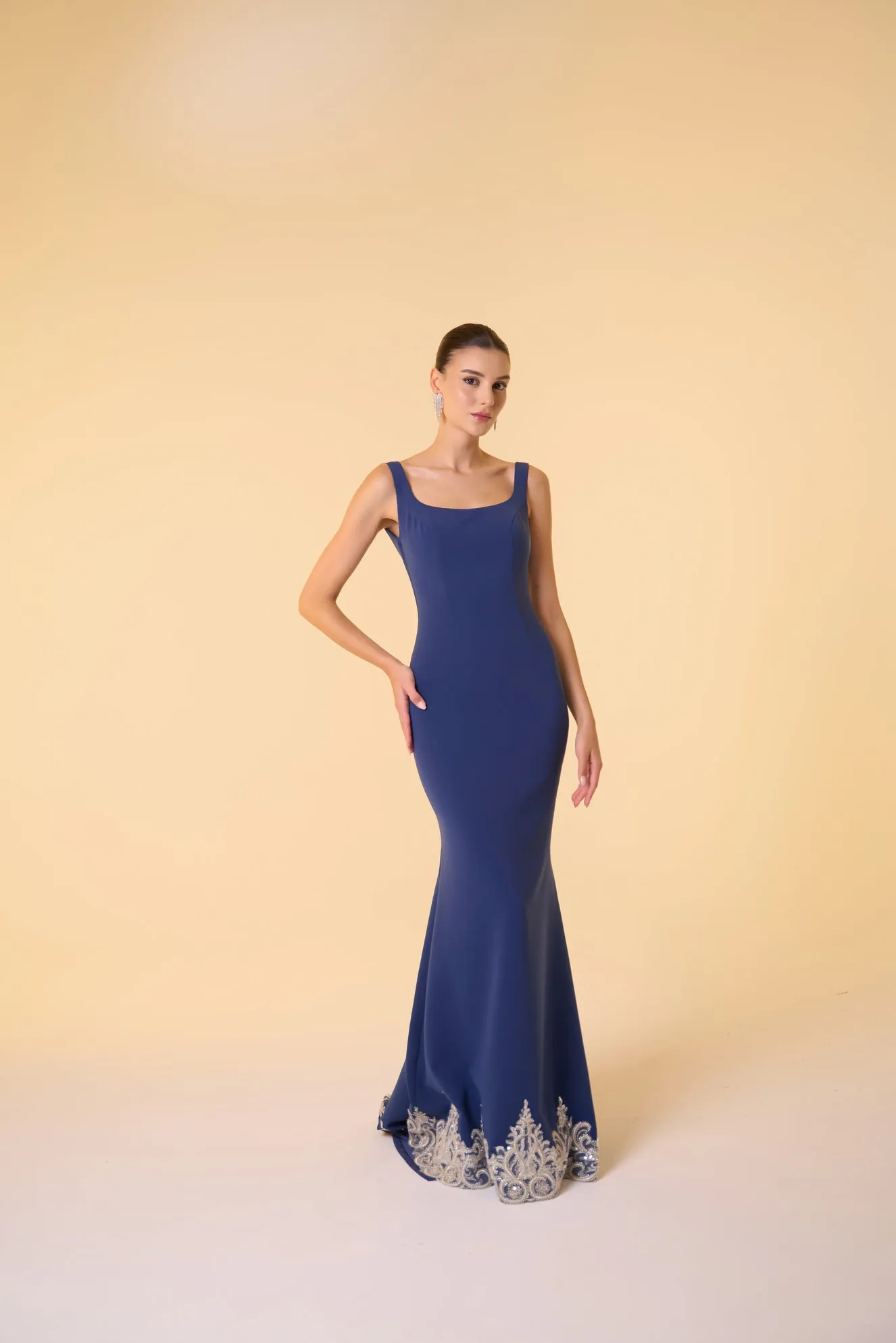 Scoop neck crepe gown with embellished hem